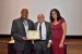 Dr. Matthew E. Edwards receiving the certificate and the medal of his designation as "Inter-Disciplinary Communication" Fellow of the IIIS.